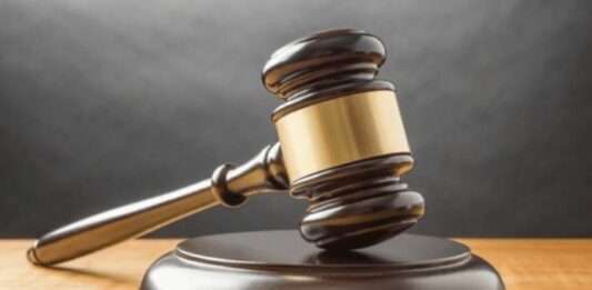 Bank employee arrested