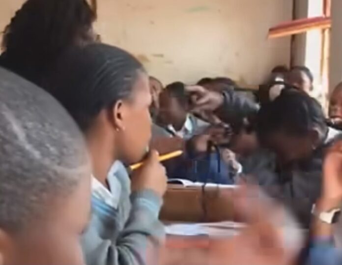 Teacher cuts pupil's braids