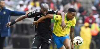 Mamelodi Sundowns and Orlando Pirates players tussling for the ball