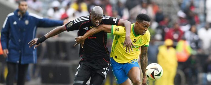 Mamelodi Sundowns and Orlando Pirates players tussling for the ball