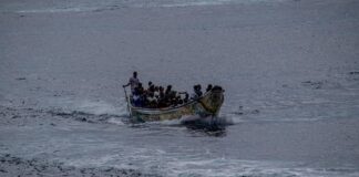 FILE: A wooden migrant boat carrying 65 people arrives at the port of La Restinga on the island of El Hierro, Canary Islands, Spain, October 24, 2025. /CFP