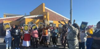 ‘You have 14 days to fix our lives’, Cape residents tell city, province and Prasa The warning followed a march through Brown’s Farm on Wednesday before residents packed Ruth First Community Hall in Sinqolamthi Street for a community meeting over safety, sanitation, electricity, roads, refuse collection and crime.