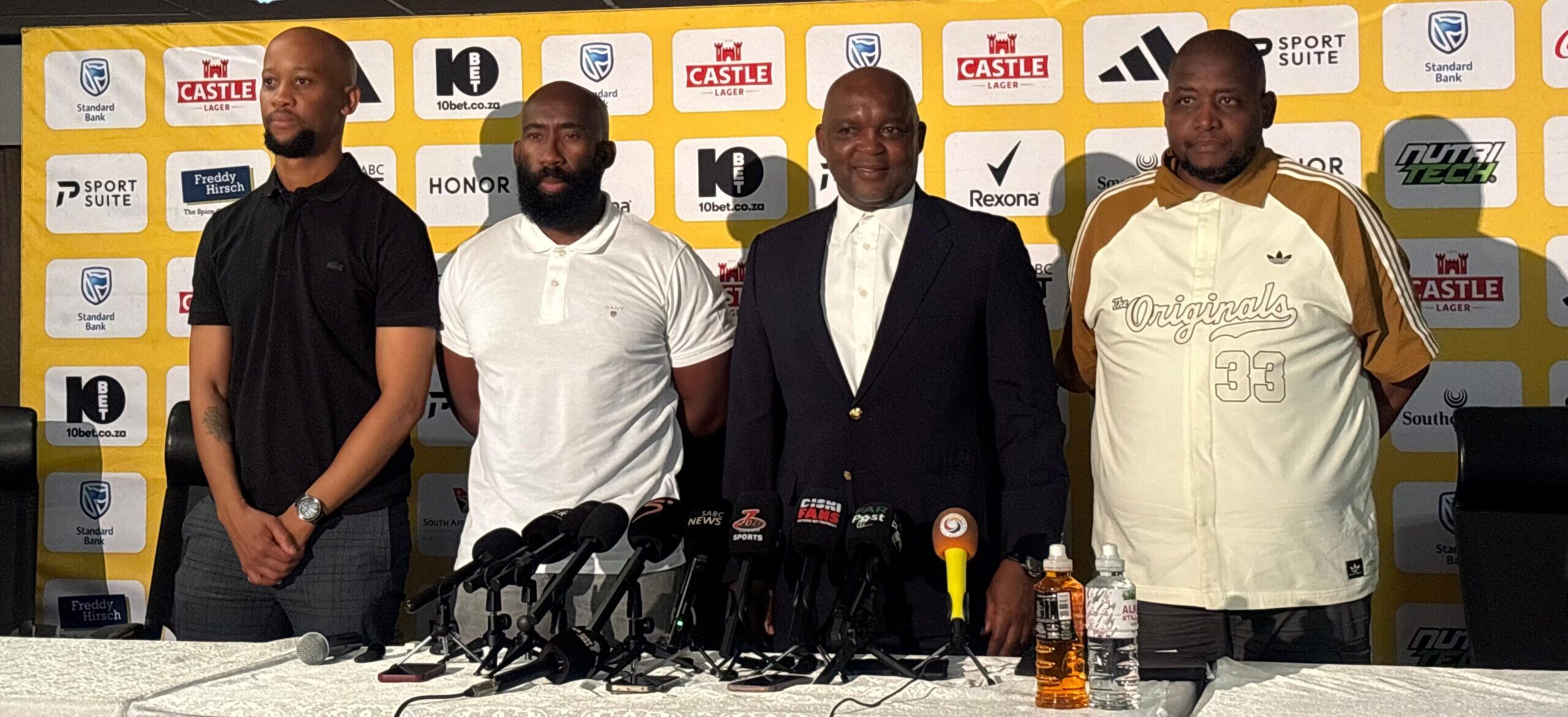 Pitso Mosimane lining up with his new technical team at Safa House.